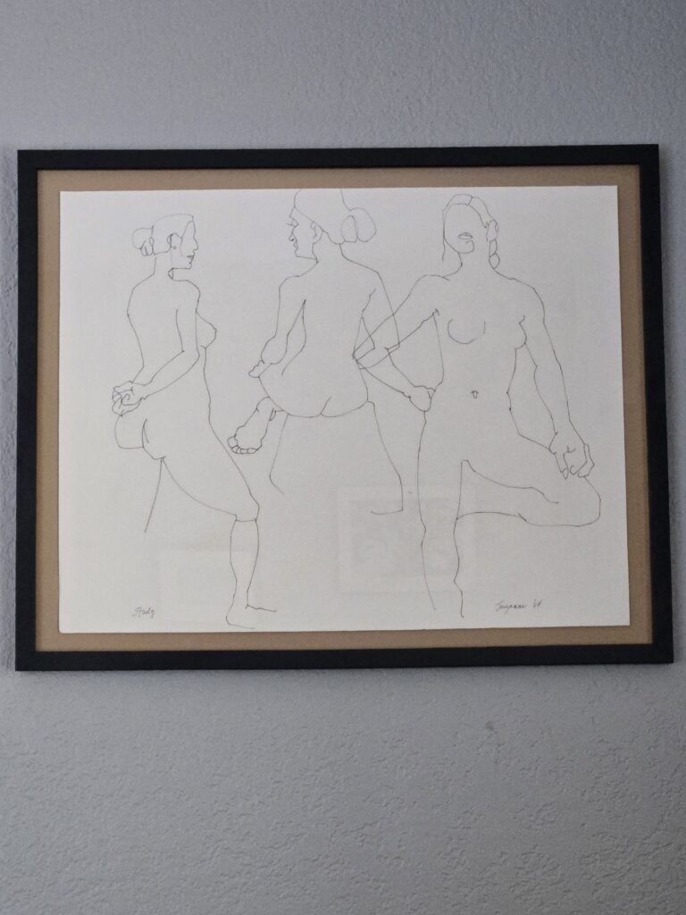 Abstract line drawing of woman in three poses